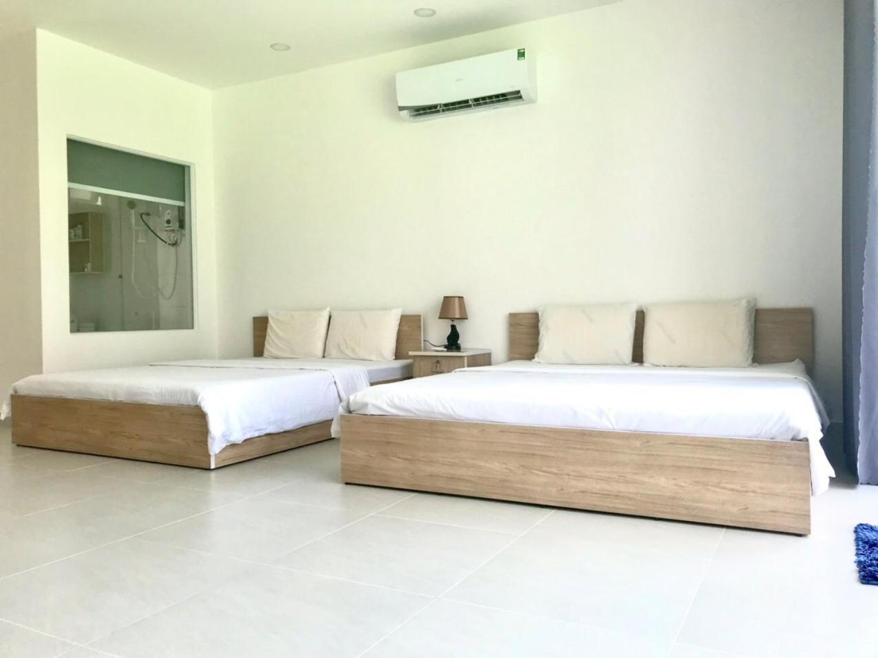 Апарт отель Larina Beach House Дуонг-Донг Экстерьер фото