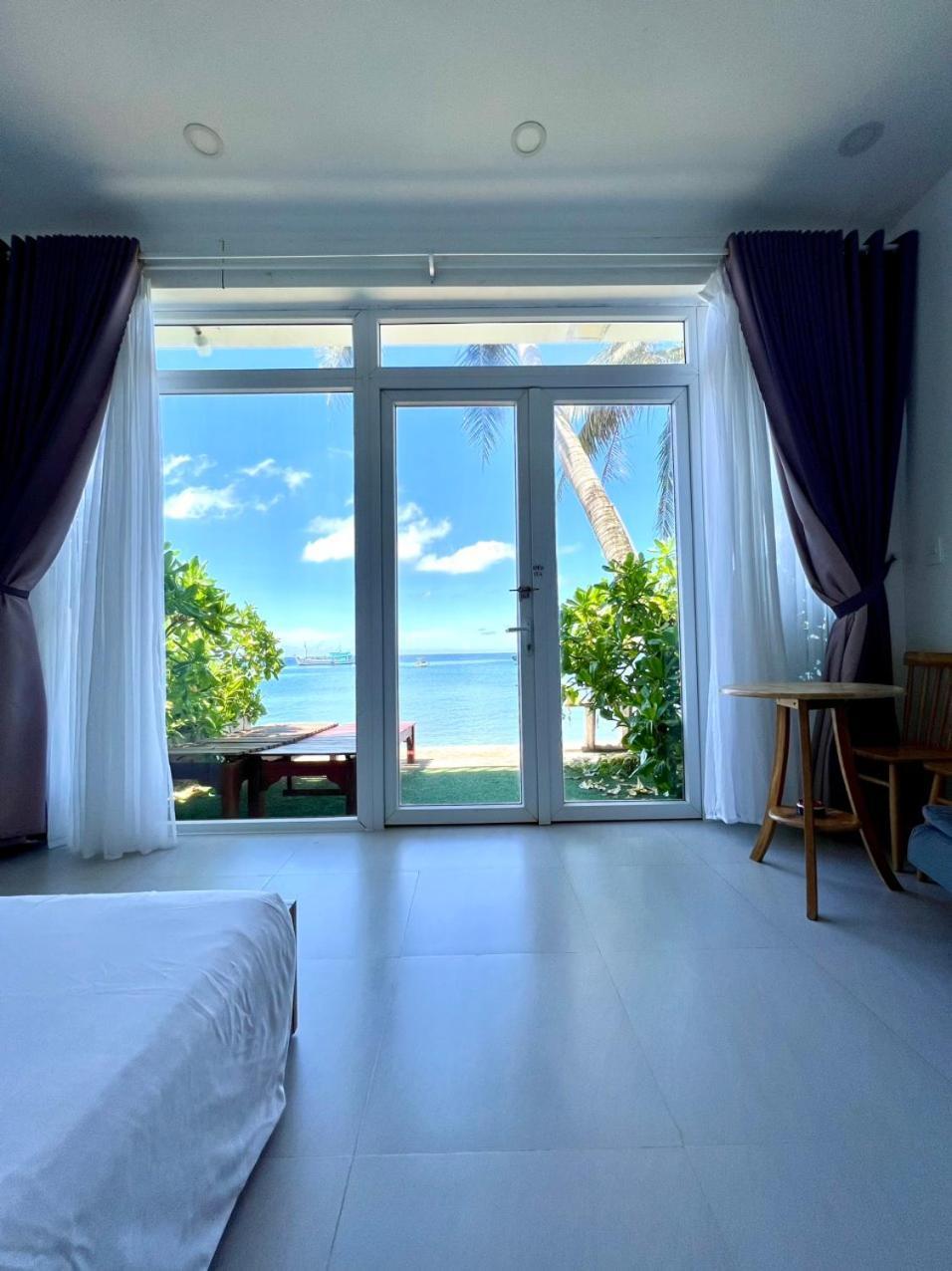 Апарт отель Larina Beach House Дуонг-Донг Экстерьер фото