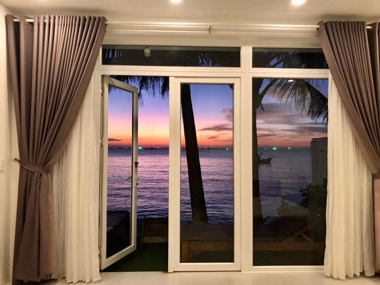 Апарт отель Larina Beach House Дуонг-Донг Экстерьер фото