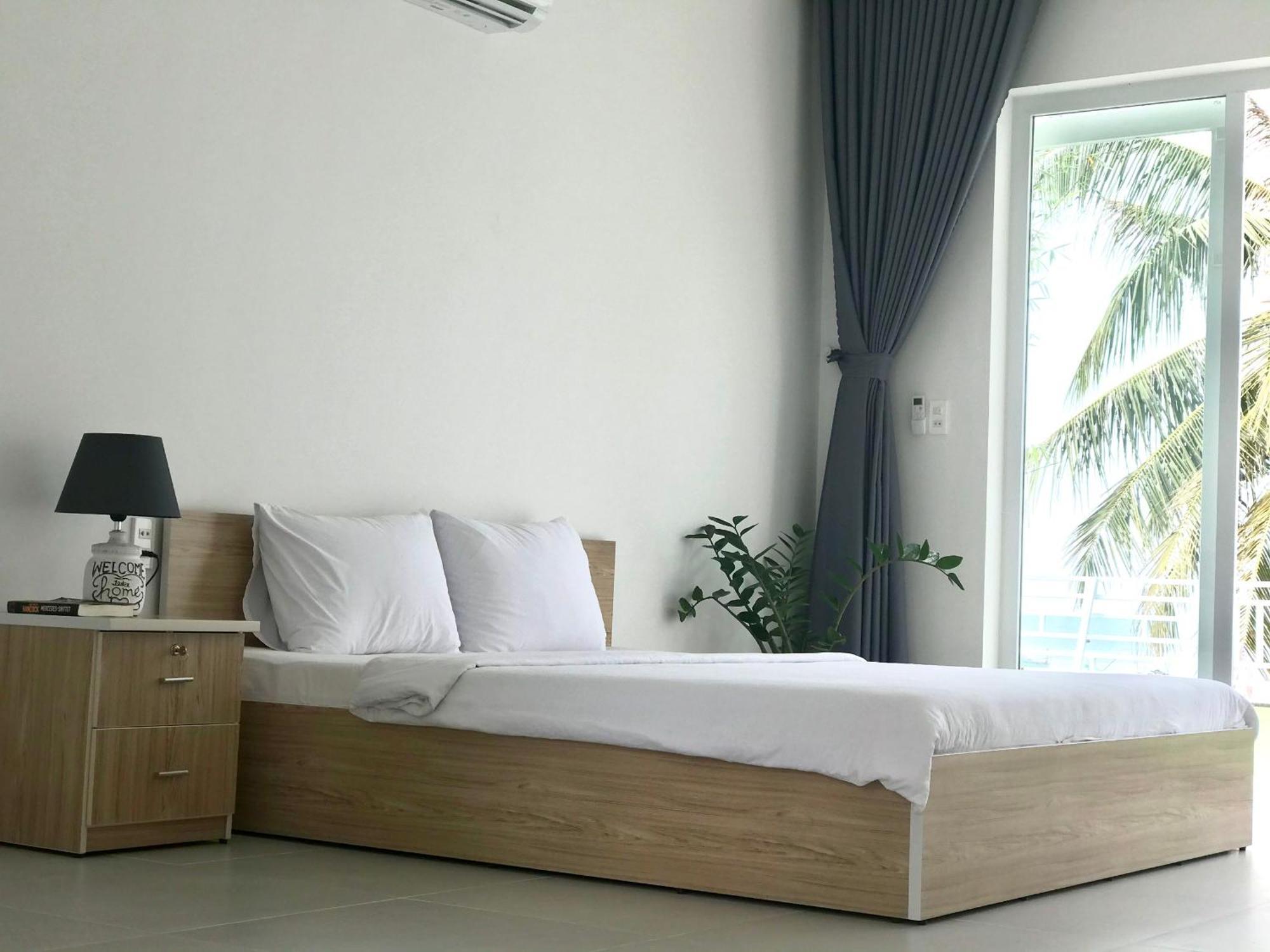 Апарт отель Larina Beach House Дуонг-Донг Экстерьер фото