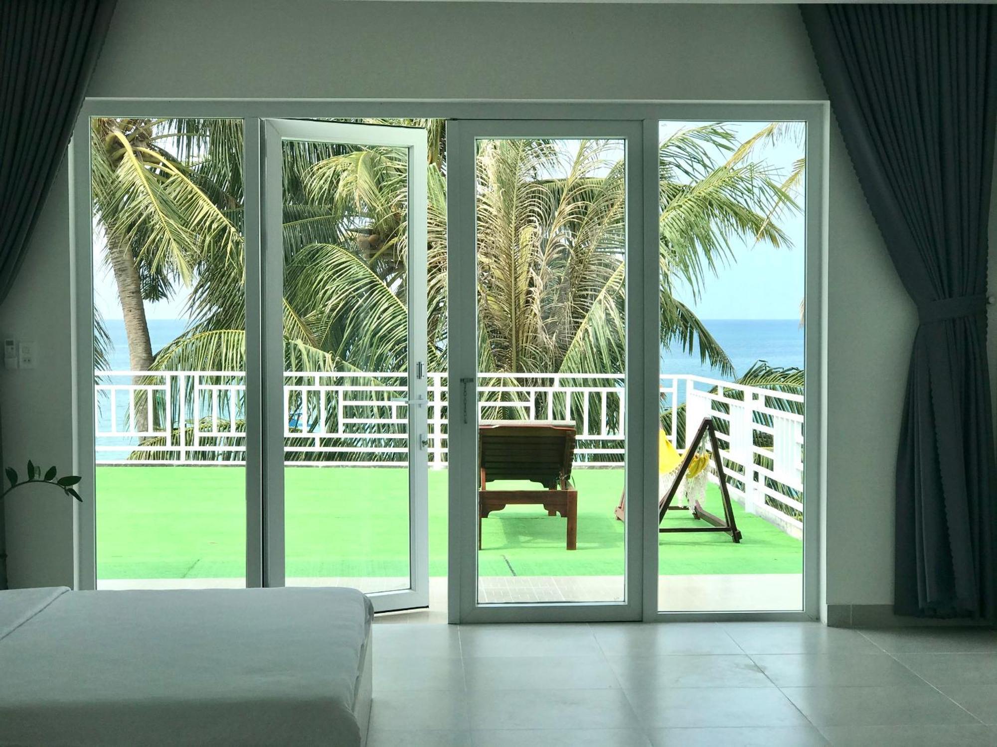 Апарт отель Larina Beach House Дуонг-Донг Экстерьер фото