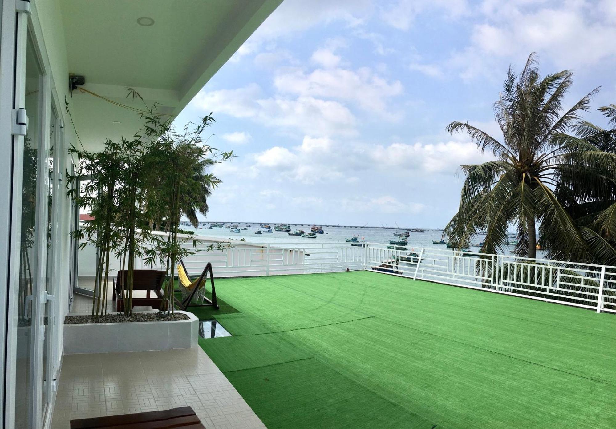 Апарт отель Larina Beach House Дуонг-Донг Экстерьер фото